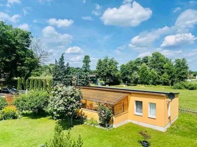 Ein Garten an der Unterkunft Spree am See - Dein Ferienhaus