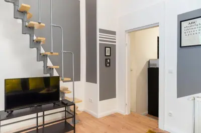 TV/Unterhaltungsangebot in der Unterkunft Cosy loft style Apartment in Berlin Wilmersdorf