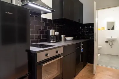Küche/Küchenzeile in der Unterkunft Cosy loft style Apartment in Berlin Wilmersdorf