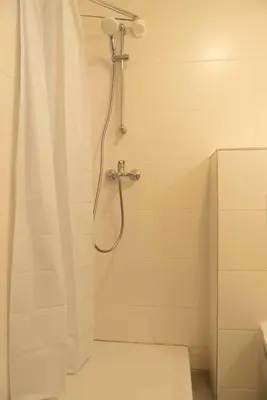 Ein Badezimmer in der Unterkunft Cosy loft style Apartment in Berlin Wilmersdorf