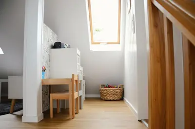 Ein Bett oder Betten in einem Zimmer der Unterkunft Ferienhaus zum Glück, mit Pool und Kamin