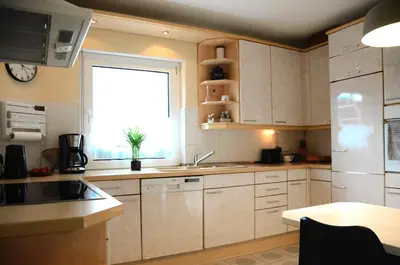 Küche/Küchenzeile in der Unterkunft Ferienhaus zum Glück, mit Pool und Kamin