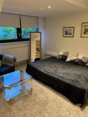 Ein Bett oder Betten in einem Zimmer der Unterkunft Zentrale Wohnung im Grünen!