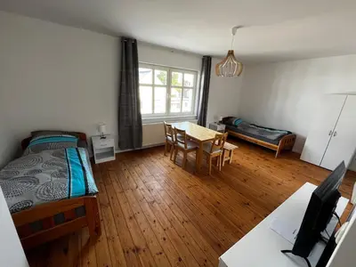 Ein Bett oder Betten in einem Zimmer der Unterkunft Große Monteurwohunung-Fewo