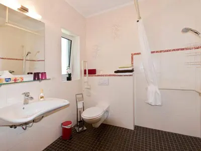 Ein Badezimmer in der Unterkunft Pension am Hasenberg