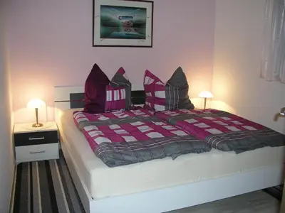 Ein Bett oder Betten in einem Zimmer der Unterkunft Domizil Neu Venedig