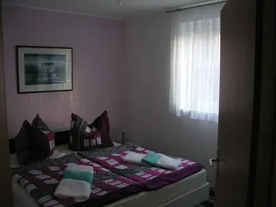 Ein Bett oder Betten in einem Zimmer der Unterkunft Domizil Neu Venedig