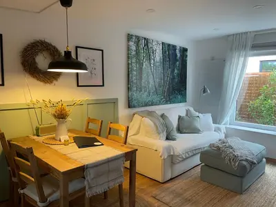 Ein Sitzbereich in der Unterkunft Kleiner gemütlicher Bungalow in Havelnähe