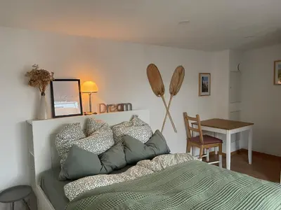 Ein Bett oder Betten in einem Zimmer der Unterkunft Kleiner gemütlicher Bungalow in Havelnähe