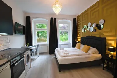 Ein Bett oder Betten in einem Zimmer der Unterkunft Style Apartment Berlin