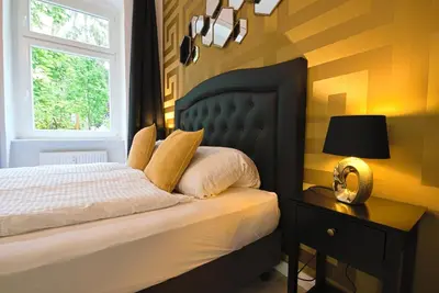 Ein Bett oder Betten in einem Zimmer der Unterkunft Style Apartment Berlin