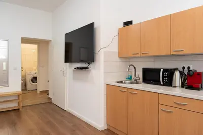 Küche/Küchenzeile in der Unterkunft NEST by Comfort Housing - 1 bedroom apartment