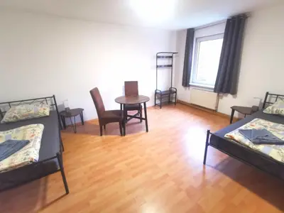 Ein Bett oder Betten in einem Zimmer der Unterkunft Monteurzimmer am Bahnhof Biesenthal - 3 große Apartments