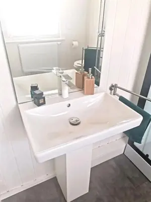 Ein Badezimmer in der Unterkunft Hafenhaus Panoramablick mit Sauna & Whirlpool