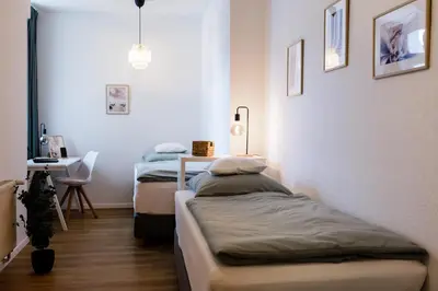 Ein Bett oder Betten in einem Zimmer der Unterkunft Modernes Apartment Lieblingsfleck I 2 Schlafzimmer I 4 Betten I Zentrumsnah