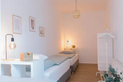 Ein Bett oder Betten in einem Zimmer der Unterkunft Modernes Apartment Lieblingsfleck I 2 Schlafzimmer I 4 Betten I Zentrumsnah