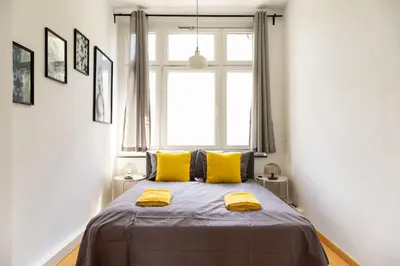 Ein Bett oder Betten in einem Zimmer der Unterkunft Central Big Apartment Self Checkin