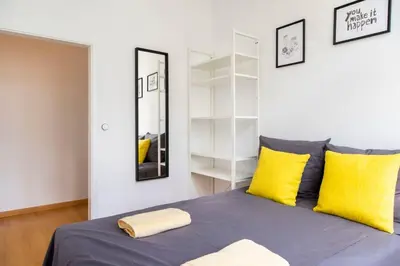 Ein Bett oder Betten in einem Zimmer der Unterkunft Central Big Apartment Self Checkin