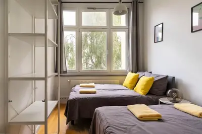 Ein Bett oder Betten in einem Zimmer der Unterkunft Central Big Apartment Self Checkin