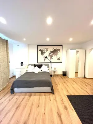 Ein Bett oder Betten in einem Zimmer der Unterkunft X-Hain Kiezwohnung