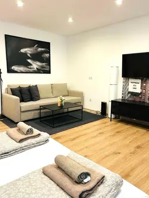 Ein Sitzbereich in der Unterkunft X-Hain Kiezwohnung