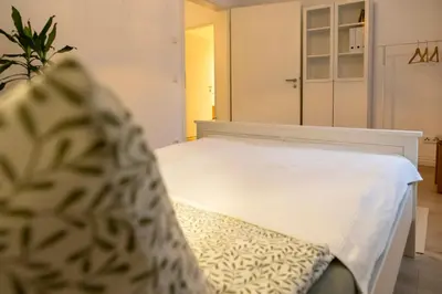 Ein Bett oder Betten in einem Zimmer der Unterkunft Zentrale Neubauwohnung in Oranienburg