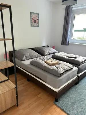 Ein Bett oder Betten in einem Zimmer der Unterkunft Eastside 35