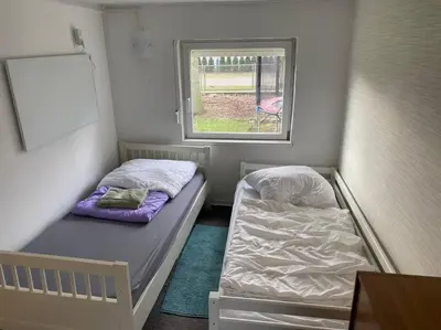 Ein Bett oder Betten in einem Zimmer der Unterkunft Bungalow im Grünen