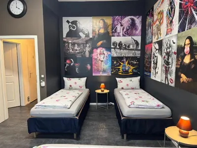 Ein Bett oder Betten in einem Zimmer der Unterkunft Exil DeLuxe
