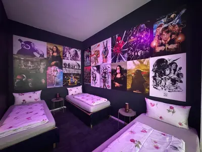 Ein Bett oder Betten in einem Zimmer der Unterkunft Exil DeLuxe