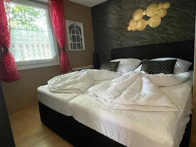 Ein Bett oder Betten in einem Zimmer der Unterkunft Bungalow am Schwielochsee 2.0