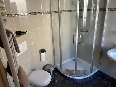 Ein Badezimmer in der Unterkunft Hotel Klement