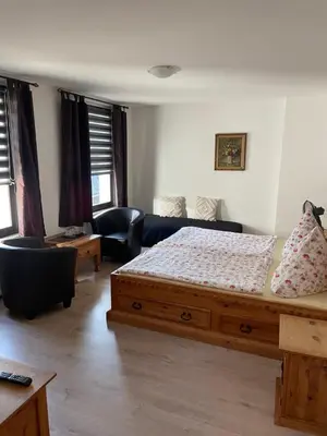 Ein Bett oder Betten in einem Zimmer der Unterkunft Hotel Klement