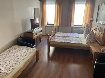 Ein Bett oder Betten in einem Zimmer der Unterkunft Hotel Klement