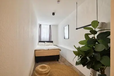Ein Bett oder Betten in einem Zimmer der Unterkunft Cityapartment für bis zu 8 Personen