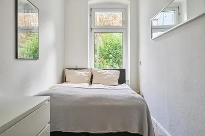 Ein Bett oder Betten in einem Zimmer der Unterkunft Cityapartment für bis zu 8 Personen