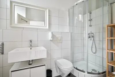 Ein Badezimmer in der Unterkunft Cityapartment für bis zu 8 Personen