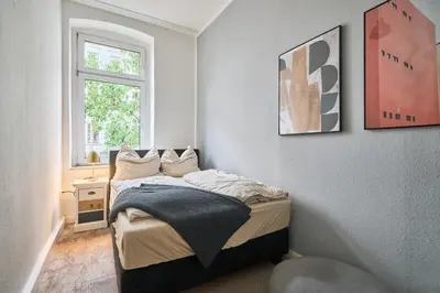 Ein Bett oder Betten in einem Zimmer der Unterkunft Cityapartment für bis zu 8 Personen