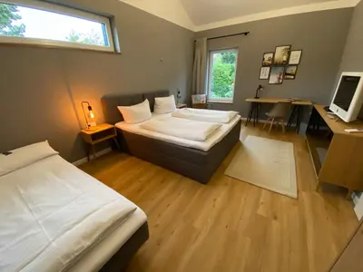 Ein Bett oder Betten in einem Zimmer der Unterkunft Ferienhaus WICA