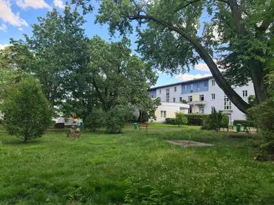 Ein Garten an der Unterkunft Casa Frida - Business Apartment near Airport BER, kitchen, bathroom, balcony, car park