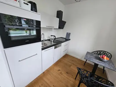 Küche/Küchenzeile in der Unterkunft Casa Frida - Business Apartment near Airport BER, kitchen, bathroom, balcony, car park