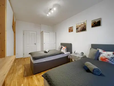 Ein Bett oder Betten in einem Zimmer der Unterkunft Apartments-Alt-Marzahn