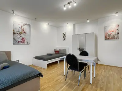 Ein Bett oder Betten in einem Zimmer der Unterkunft Apartments-Alt-Marzahn