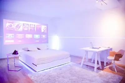 Ein Bett oder Betten in einem Zimmer der Unterkunft Cosy Apartment at Prenzlauer Berg with Terrace and HeadphoneCinema