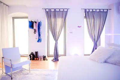 Ein Bett oder Betten in einem Zimmer der Unterkunft Cosy Apartment at Prenzlauer Berg with Terrace and HeadphoneCinema