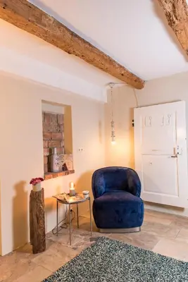 Ein Sitzbereich in der Unterkunft Kuscheliges Landhaus
