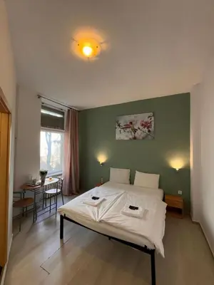 Ein Bett oder Betten in einem Zimmer der Unterkunft Stadtoase im Herzen Berlins