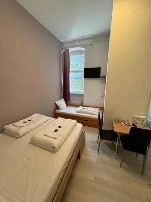 Ein Bett oder Betten in einem Zimmer der Unterkunft Stadtoase im Herzen Berlins