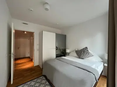 Ein Bett oder Betten in einem Zimmer der Unterkunft Modern Apartment in Mitte