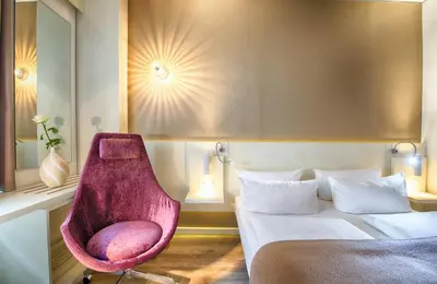 Ein Bett oder Betten in einem Zimmer der Unterkunft Leonardo Hotel Berlin Mitte